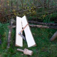 cleft in half with very big froe